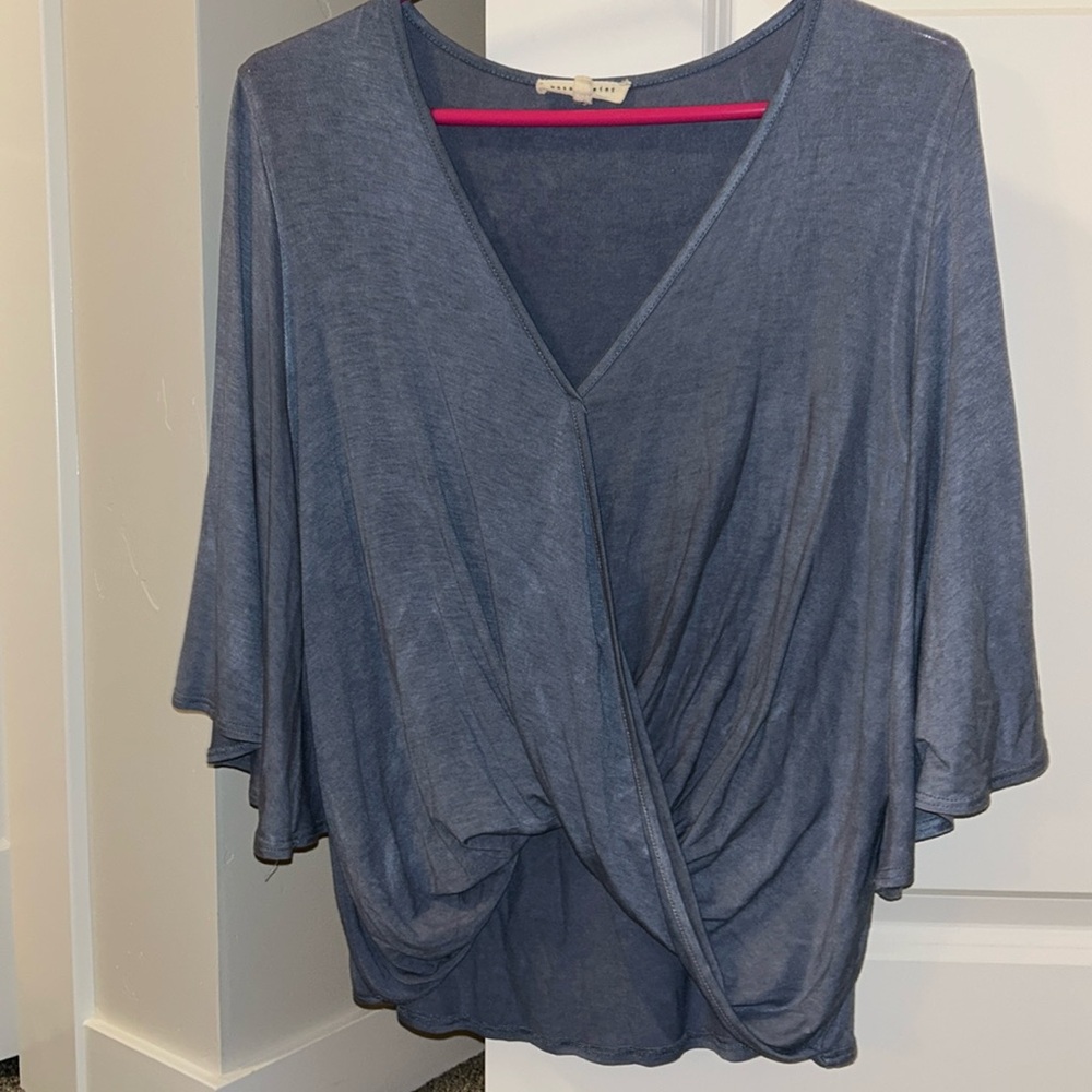 blue flowy top from a boutique